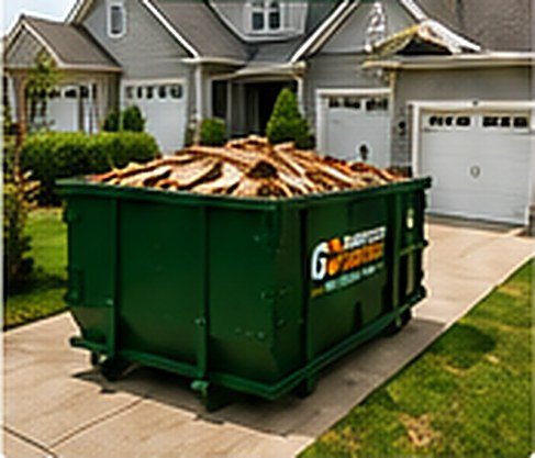 10 yard dumpster parked in a residential driveway